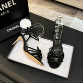 HIGH HEEL SANDAL WITH BOW IN BLACK LAMBSKIN